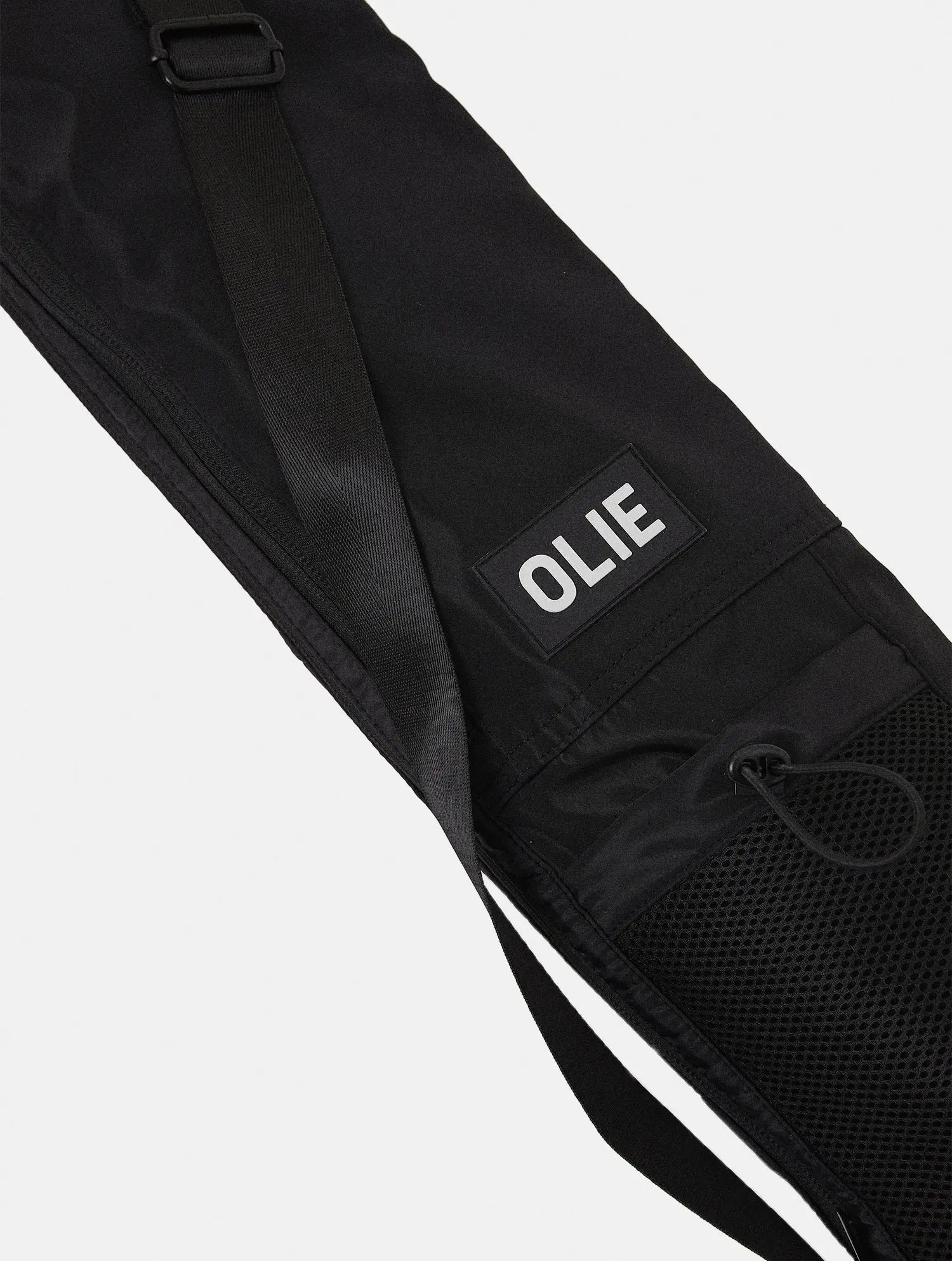 The OLIE BLACK YOGA MAT BAG. Made From 100% Recycled Materials. An Enhanced Take On The Classic Yoga Mat Bag.