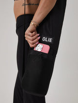 The OLIE BLACK YOGA MAT BAG. Made From 100% Recycled Materials. An Enhanced Take On The Classic Yoga Mat Bag.