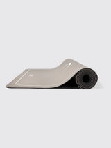 The Grippiest Yoga And Pilates Mat - The STONE MOON MAT - A Stone colour with the famous OLIE Moons down the centre.
