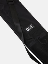 The OLIE BLACK YOGA MAT BAG. Made From 100% Recycled Materials. An Enhanced Take On The Classic Yoga Mat Bag. 